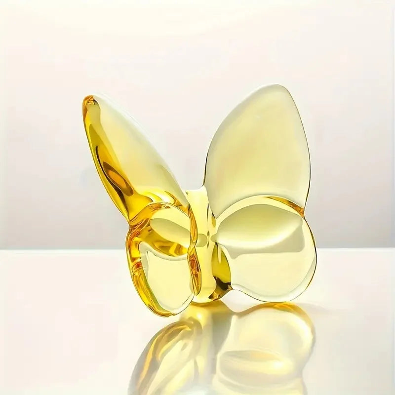 Yellow crystal glass butterfly desk ornament with glossy reflective wings and mirrored base
