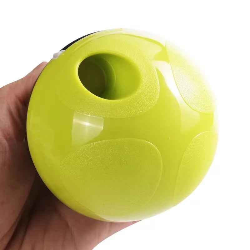 Green pet puzzle treat tumbler toy with wide feeding opening and rounded body