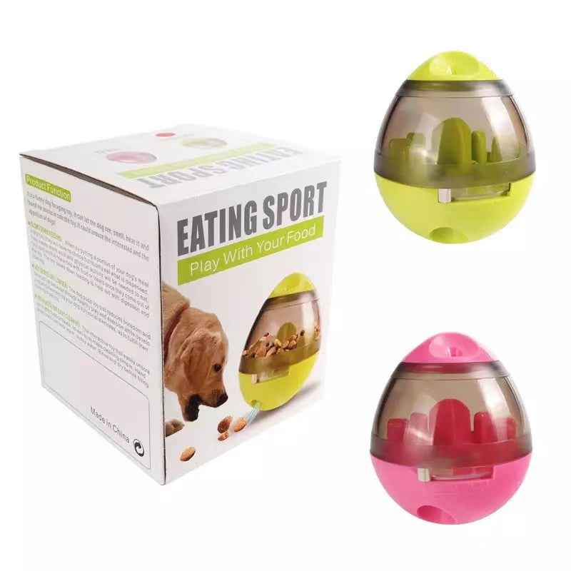 Pet puzzle treat tumbler toy in green and pink with clear top and internal divider