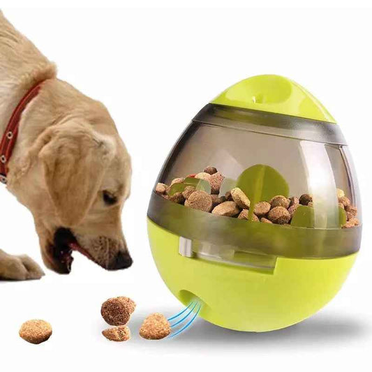 Green pet puzzle treat tumbler toy with rotating inner compartment and food pieces