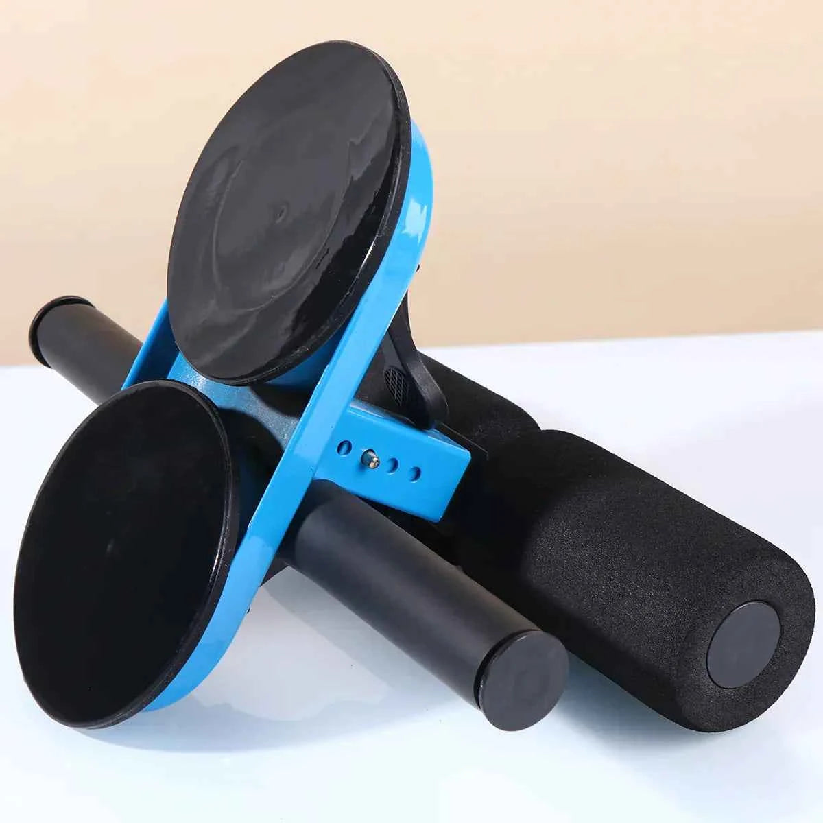 Blue-and-black sit-up assist with wide suction pads and black foam shoulder rollers