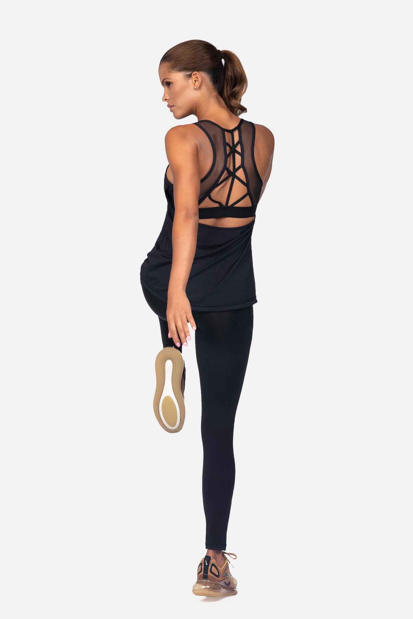 Women's black fitness tank top with crisscross open-back straps