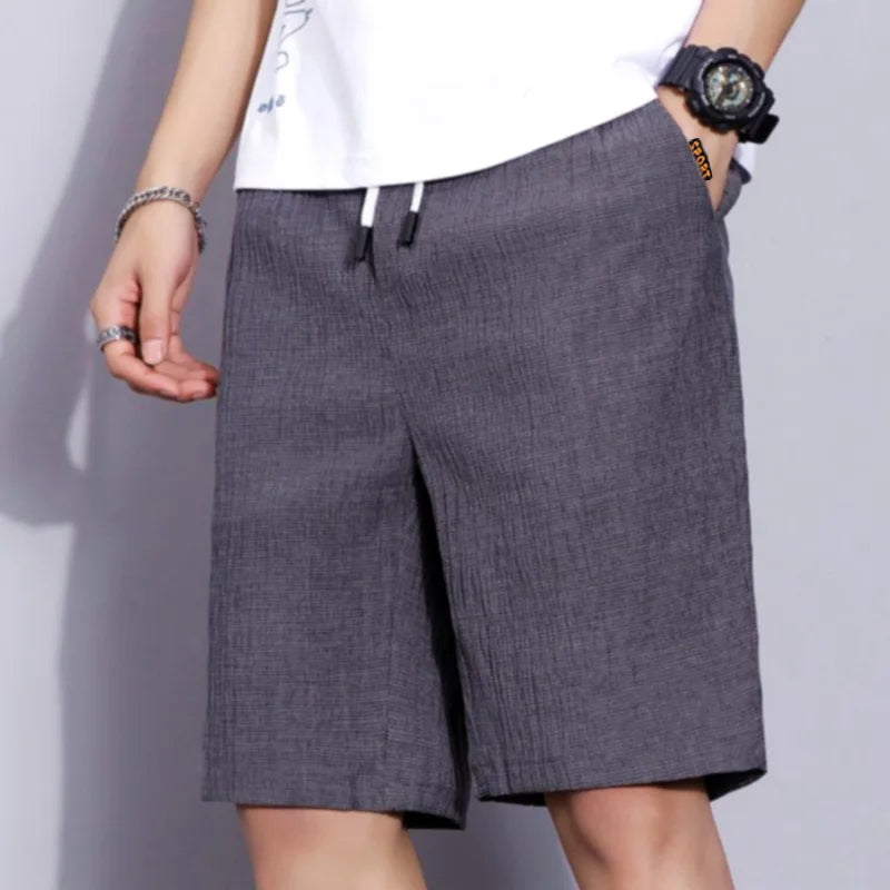 Men's dark gray casual shorts with elastic waist and drawstring