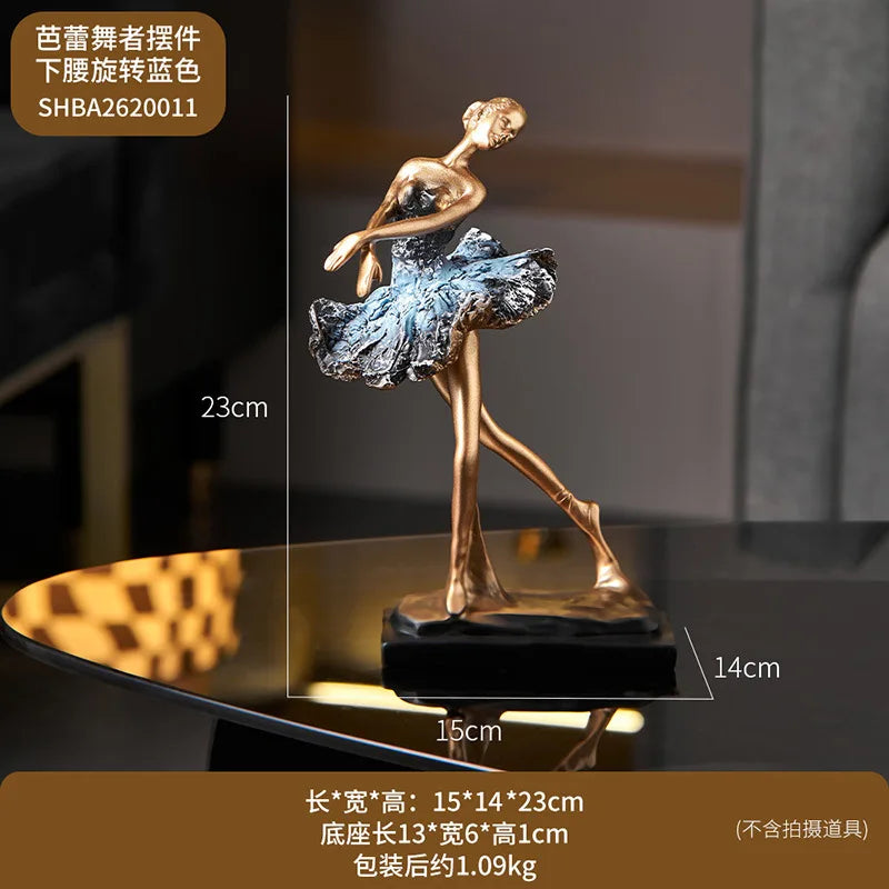 Blue ballet dancer resin sculpture with gold arms, blue tutu, on black base