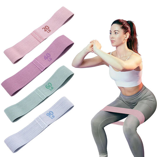 Set of anti-slip hip resistance bands in pink, green, and purple colors
