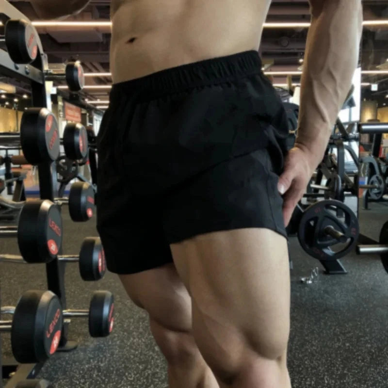 Men's gym drawstring shorts with elastic waist, black knee-length