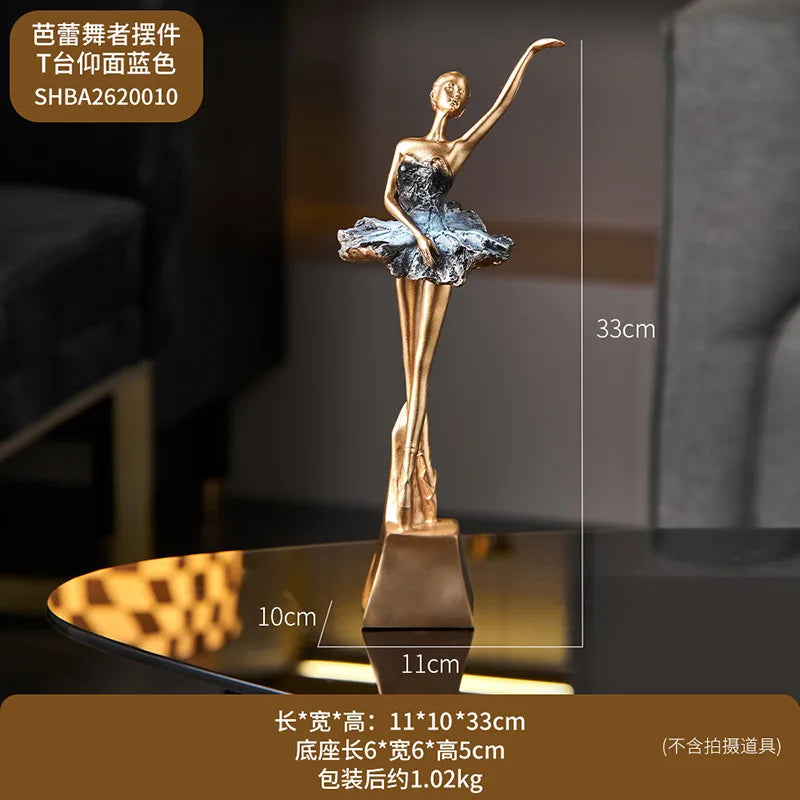 Blue ballet dancer resin sculpture with gold torso, blue tutu, on square base