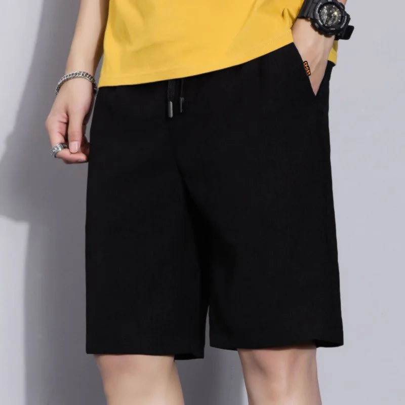 Men's black casual shorts with elastic waistband and drawstring