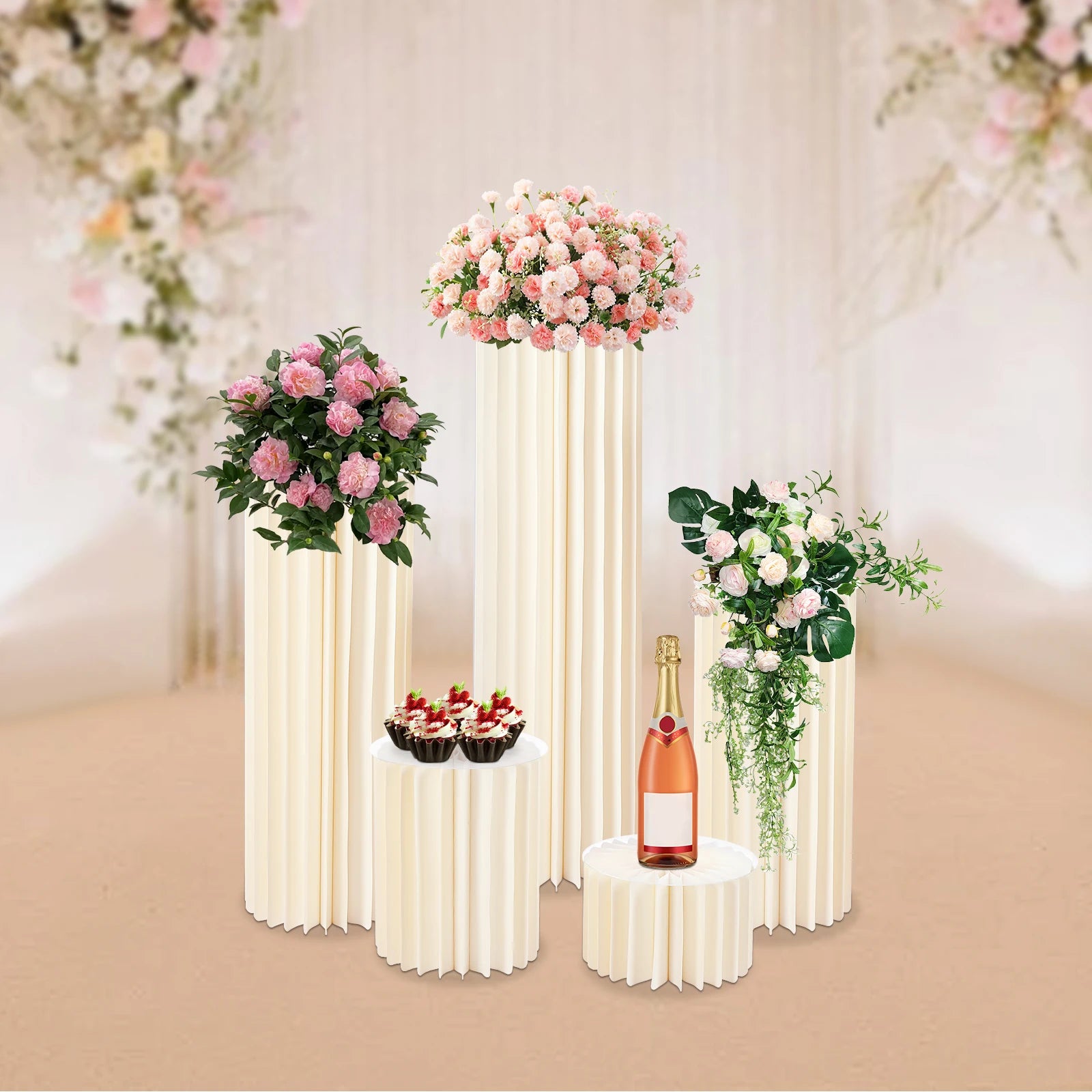 Milky white cardboard flower stands with scalloped, ribbed sides and floral arrangements on top