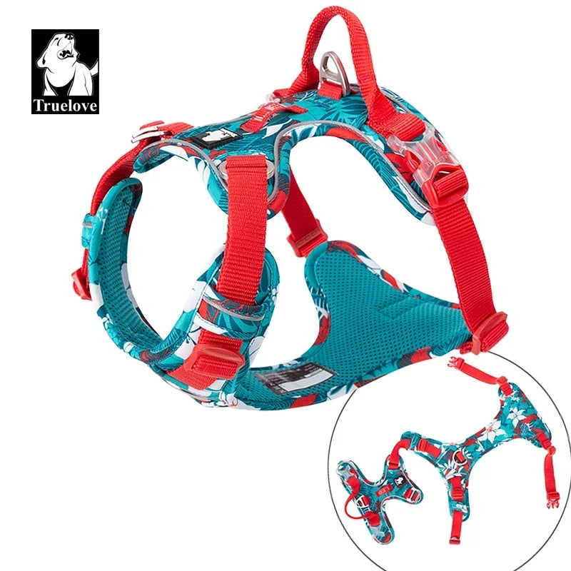 Teal and red reflective camouflage dog harness with adjustable straps and padded chest panel