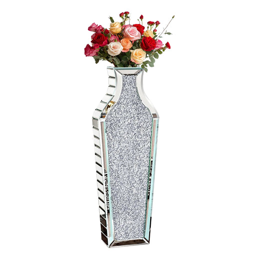 Silver mirrored glass floor vase with crushed-diamond sparkle and a rose bouquet
