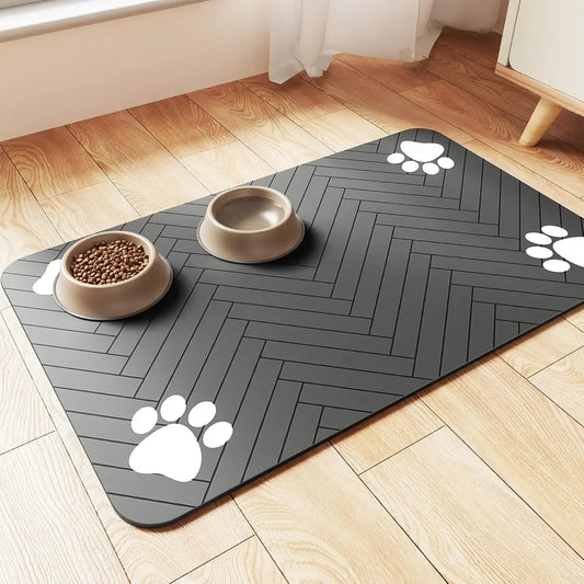 Absorbent dark gray pet feeding mat with paw-print pattern and raised border