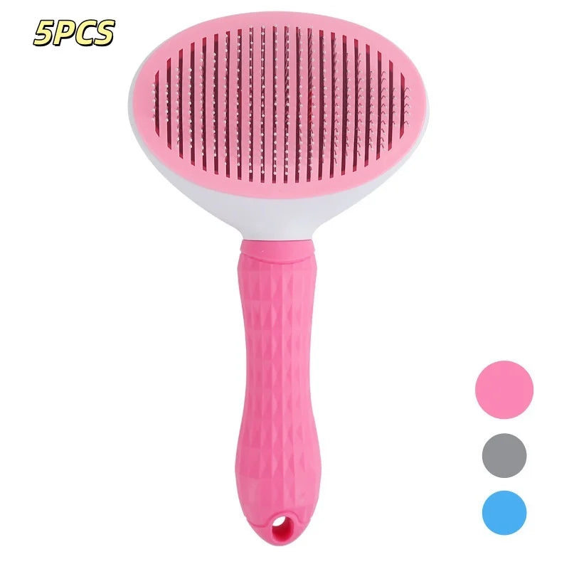 Pink self-cleaning pet brush with oval head and metal pins, textured grip handle
