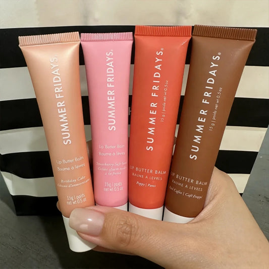 Assorted lip balm tubes in nude, pink, orange, and brown tones
