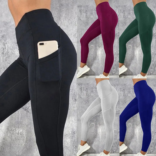 High-waist yoga leggings in black with side pocket detail, full length.