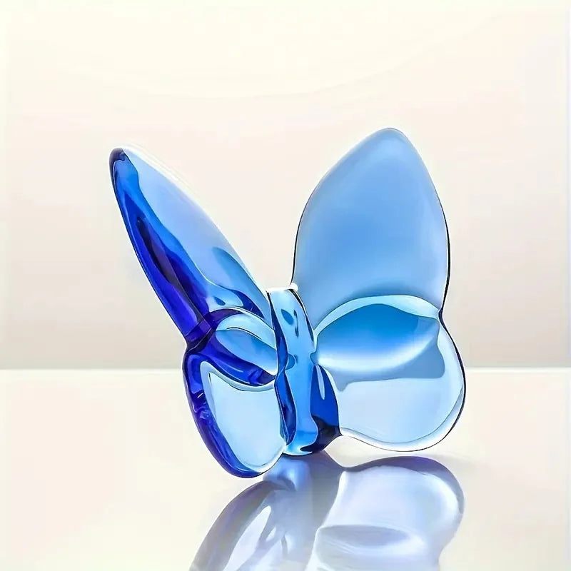 Blue crystal glass butterfly desk ornament with glossy reflective wings and mirrored base
