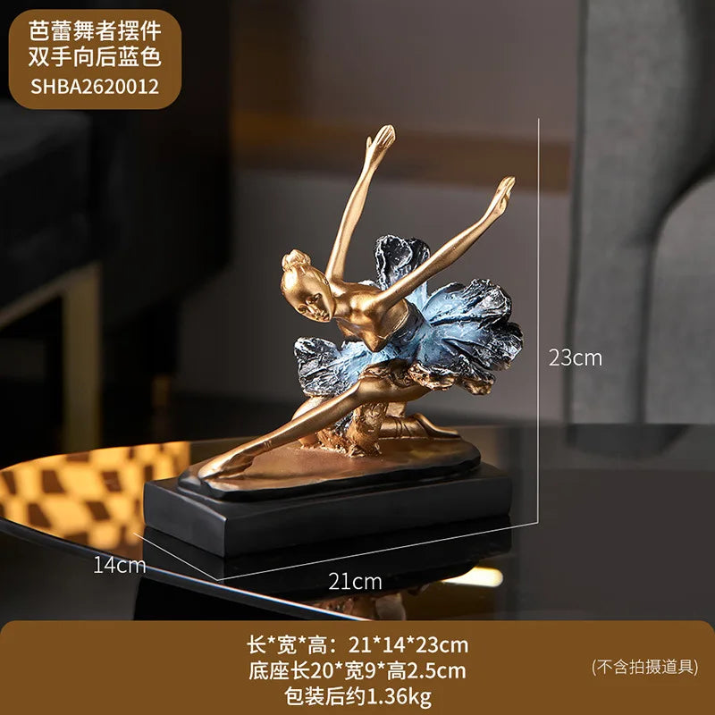 Blue ballet dancer resin sculpture with gold arms and legs, blue tutu, on black base