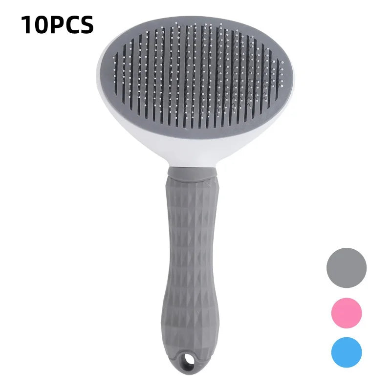 Gray pet grooming brush with oval paddle head and textured grip handle