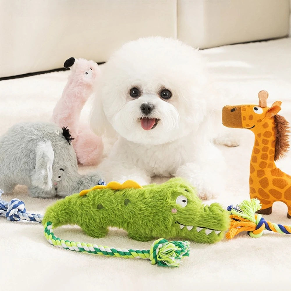 Green plush crocodile dog toy with braided rope tug tail and squeaker