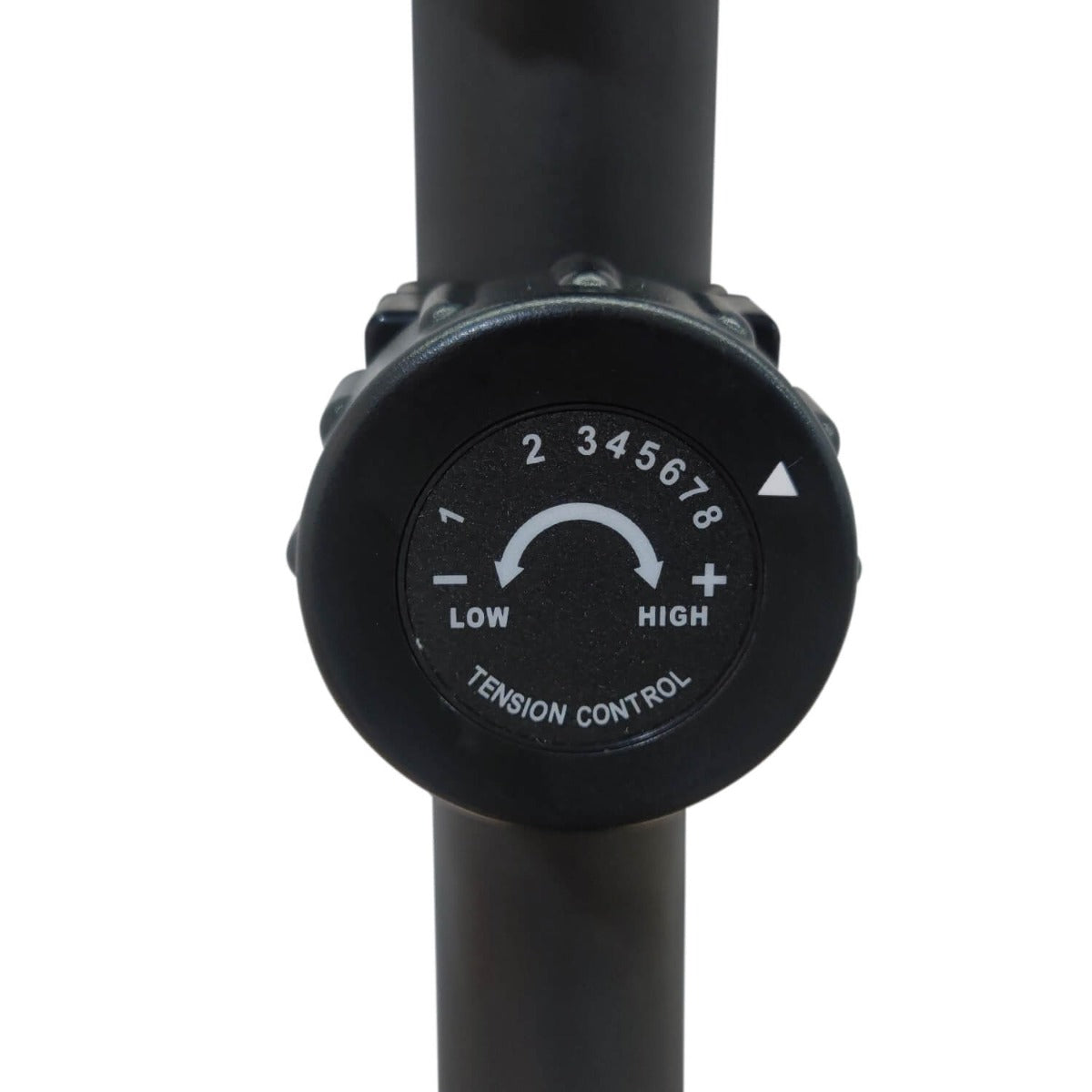 Stationary bike tension control dial labeled low and high